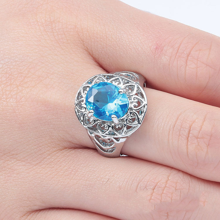 Inlaid Light Blue Drill Hollowed Out Heart Ring Ring For Men And Women